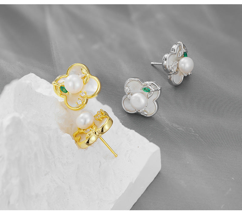 INS Hot-selling 925 Sterling Silver Lucky Grass Pearl Stud Earrings Women's Niche Design High-end Light Luxury Earrings