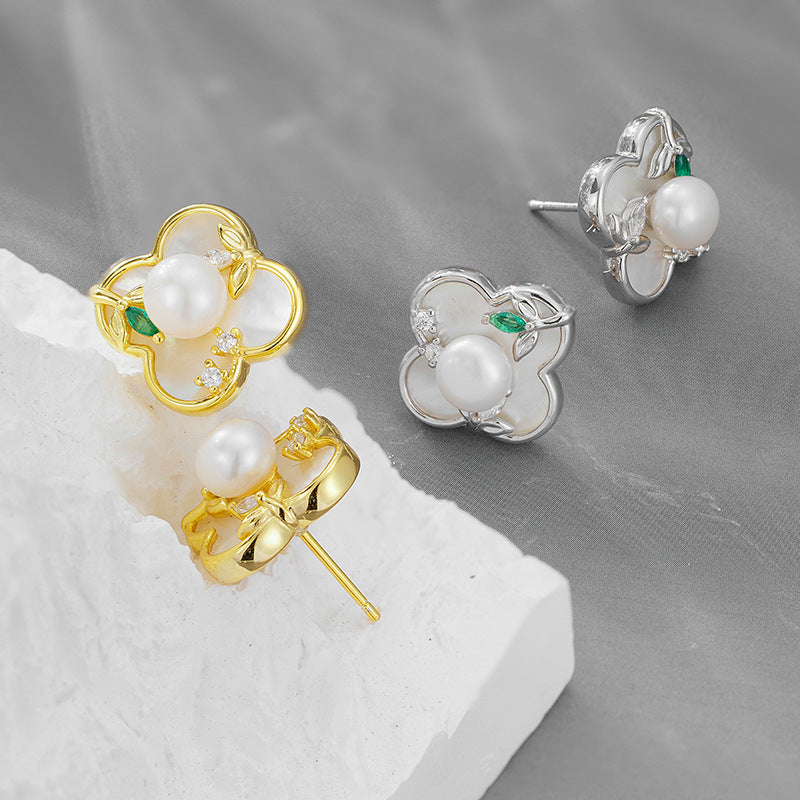 INS Hot-selling 925 Sterling Silver Lucky Grass Pearl Stud Earrings Women's Niche Design High-end Light Luxury Earrings