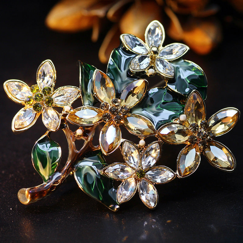 Champagne Gold Floral Brooch – Crystal Flower Pin with Enamel Detail